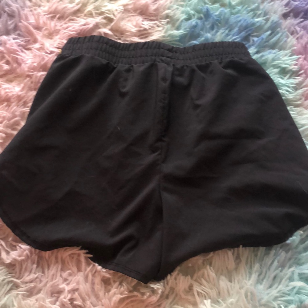 Really nice shorts that are black size 78 with underwear in the shorts.